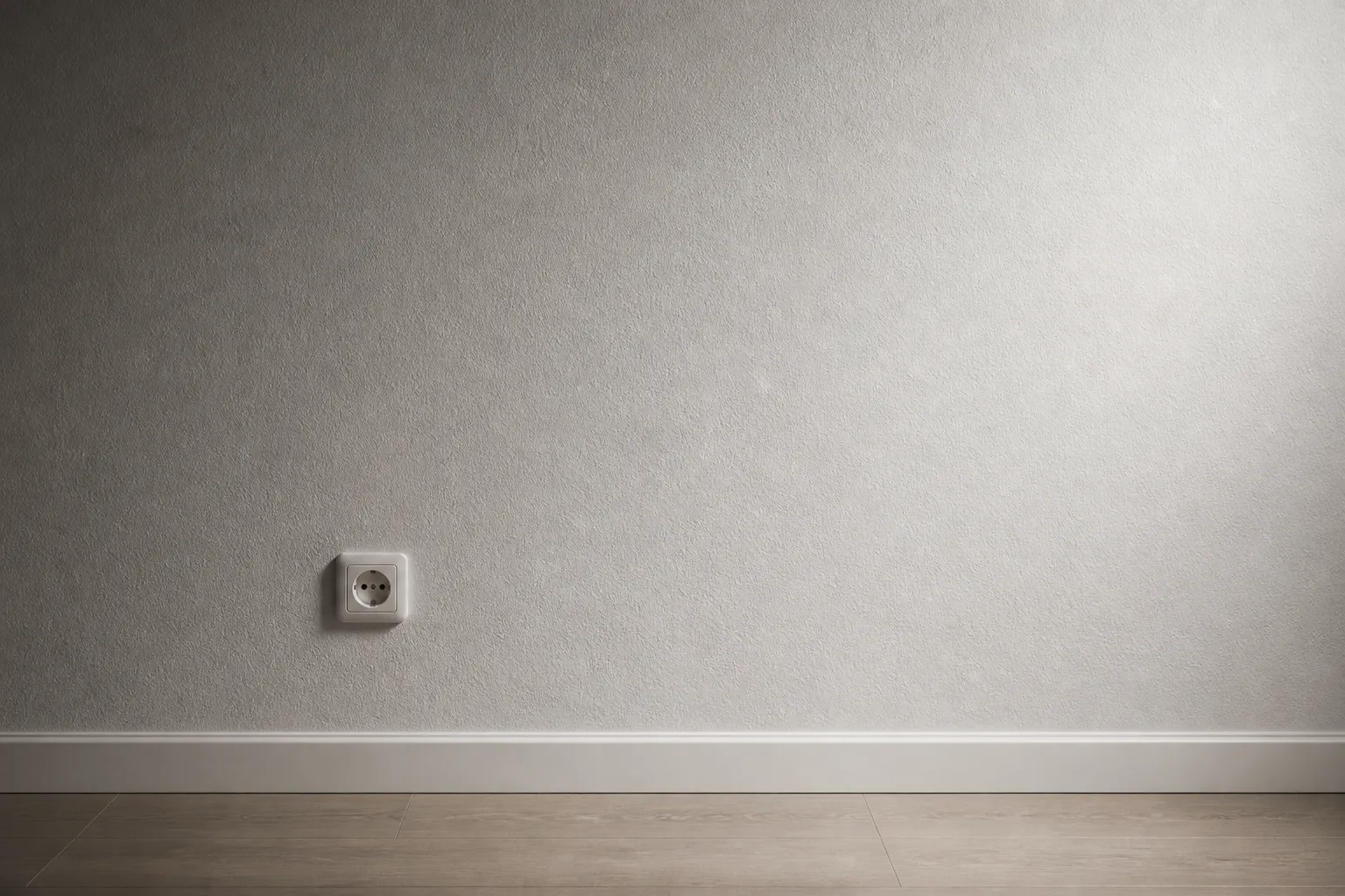 Mur doublé en plaques de plâtre avec une prise électrique
